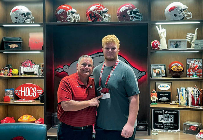 Wakeland High School offensive lineman Connor Stroh hangs out with Arkansas coach Sam Pittman during an April visit to Fayetteville. It was Stroh's second time to make the drive from Frisco, Texas in the span of just a few months.